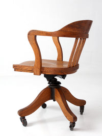 antique Gunlocke banker' swivel desk chair