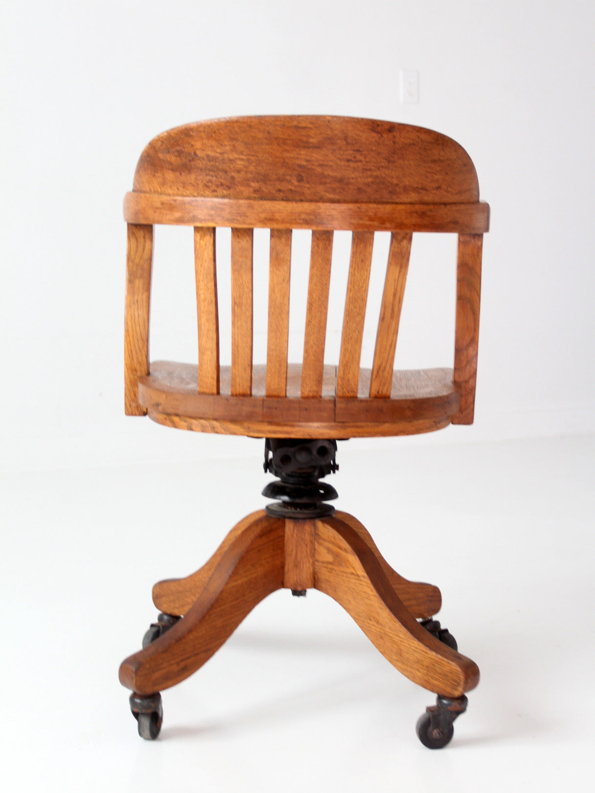 antique Gunlocke banker' swivel desk chair