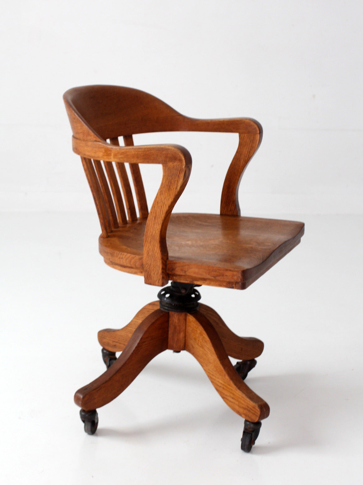 antique Gunlocke banker' swivel desk chair