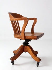 antique Gunlocke banker' swivel desk chair