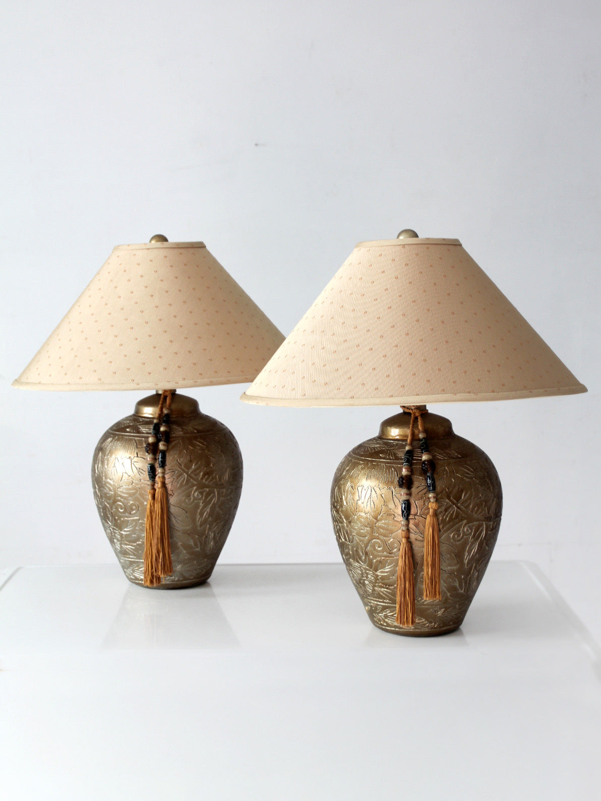 pair of vintage Chinoiserie style gilt ceramic table lamps