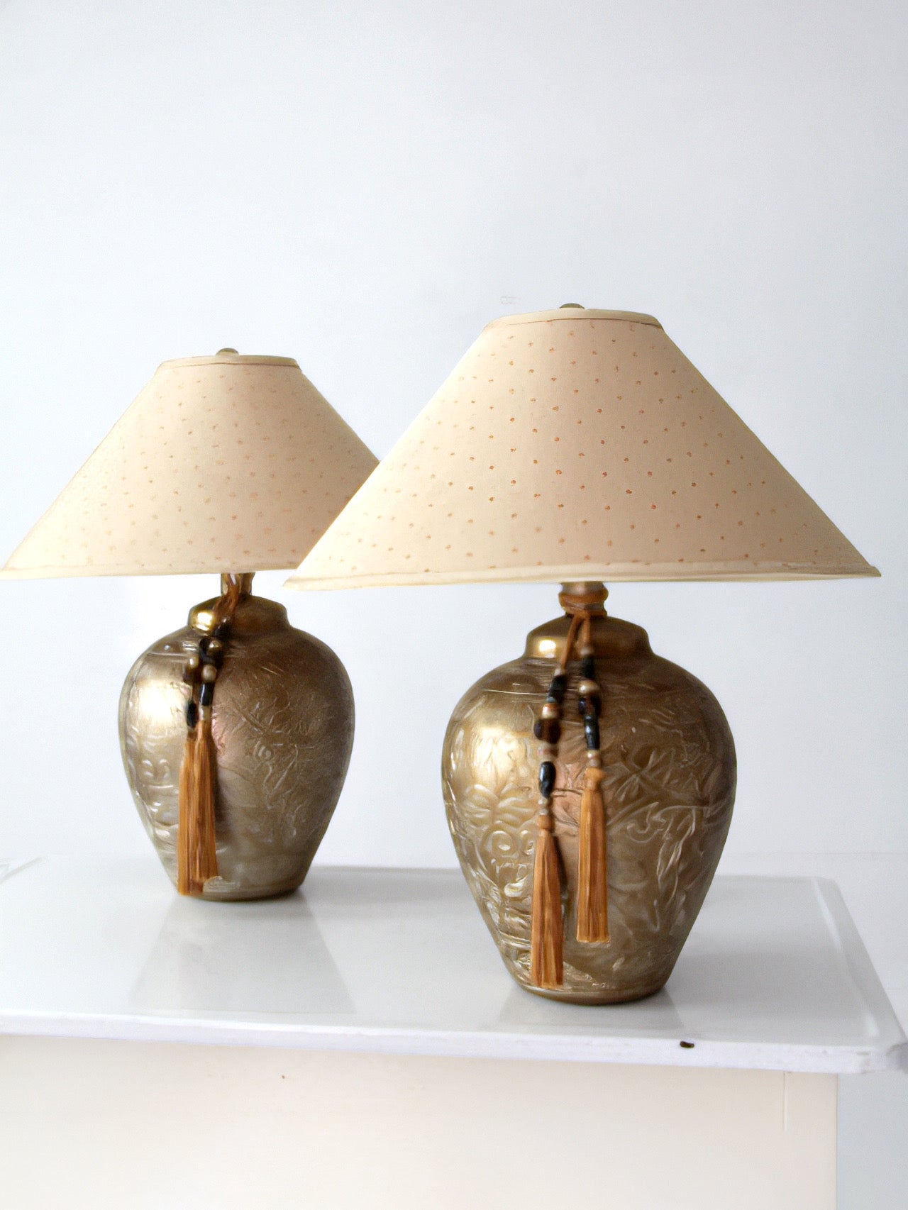 pair of vintage Chinoiserie style gilt ceramic table lamps