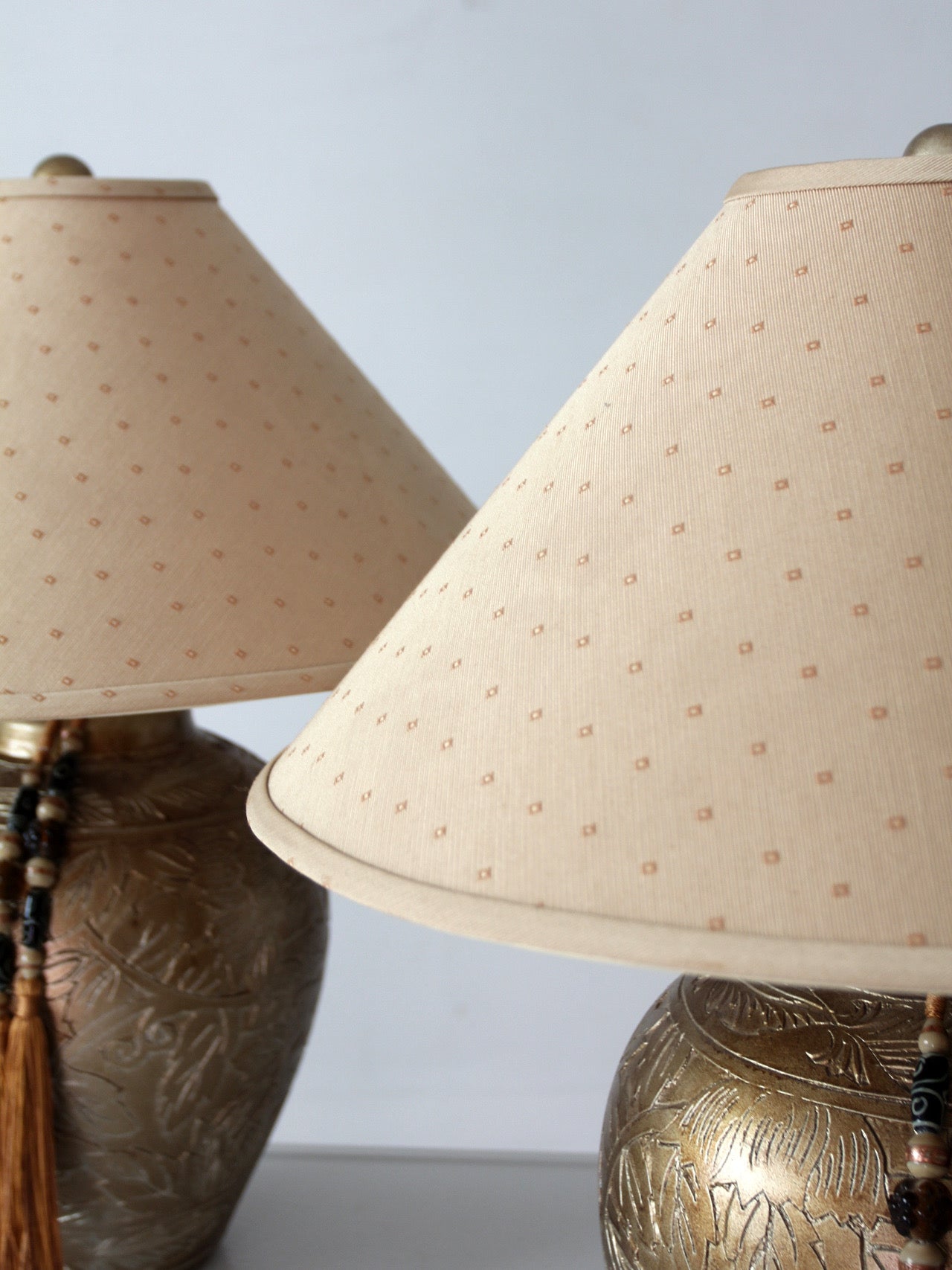 pair of vintage Chinoiserie style gilt ceramic table lamps