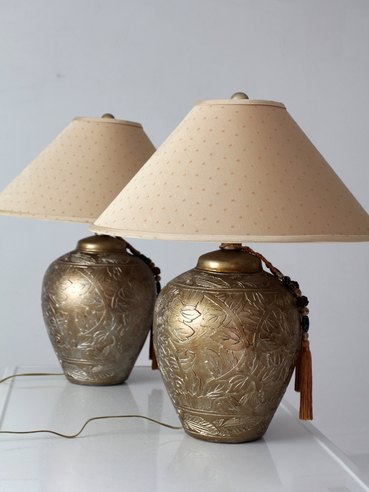 pair of vintage Chinoiserie style gilt ceramic table lamps