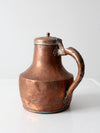 antique copper pitcher