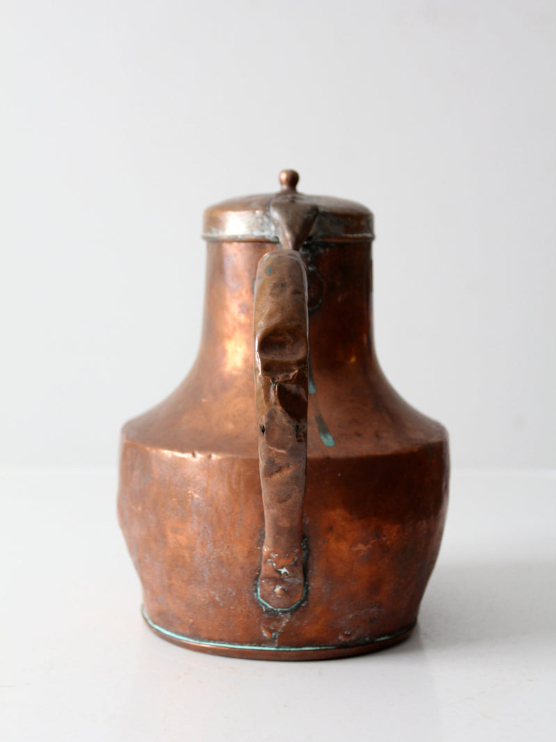 antique copper pitcher