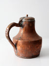 antique copper pitcher