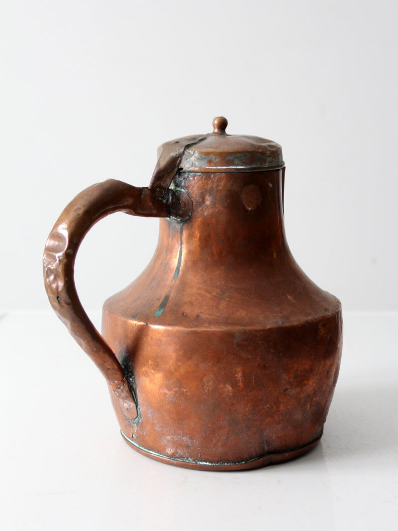 antique copper pitcher