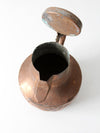 antique copper pitcher