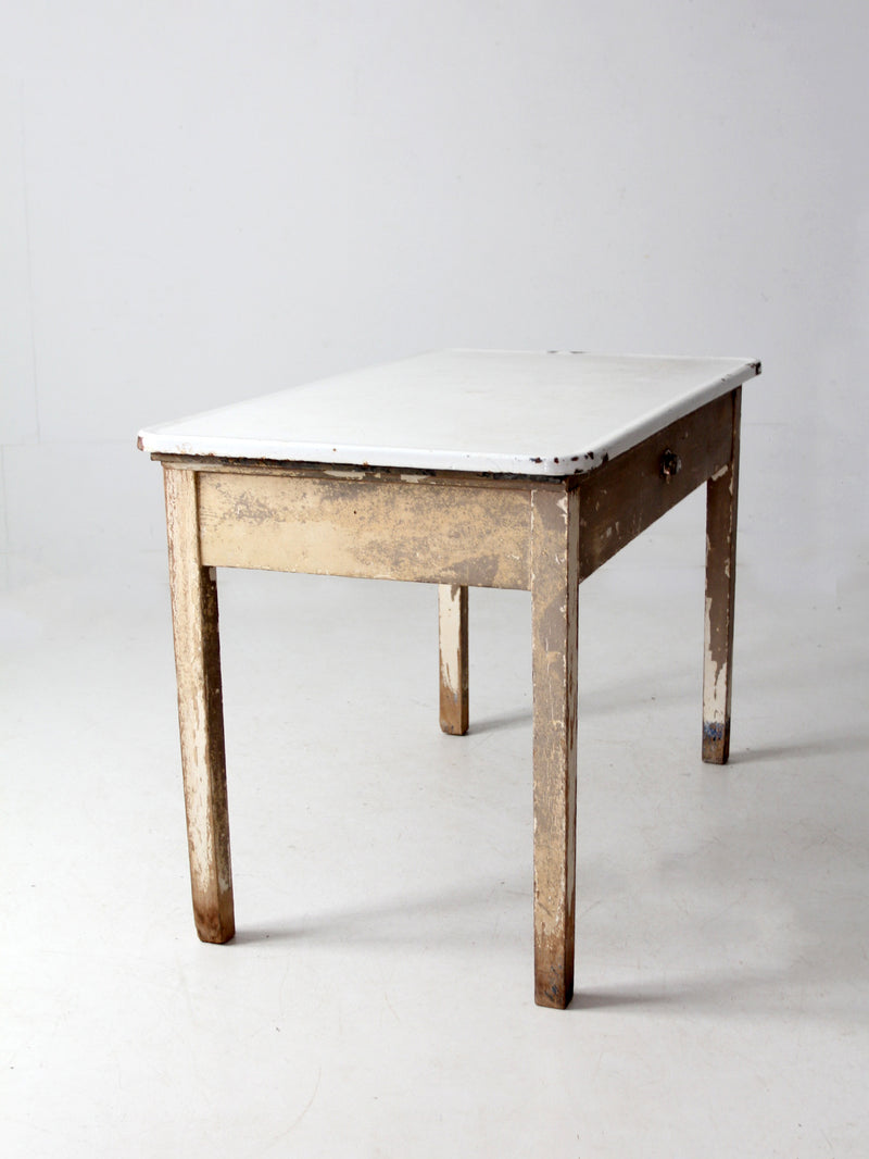 antique enamel top table with ironing board