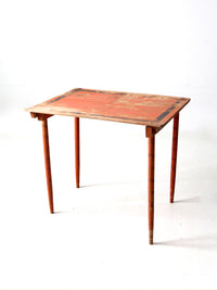 antique orange painted wood clipper folding table