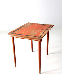 antique orange painted wood clipper folding table