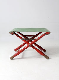 vintage red and green x-frame camp stool