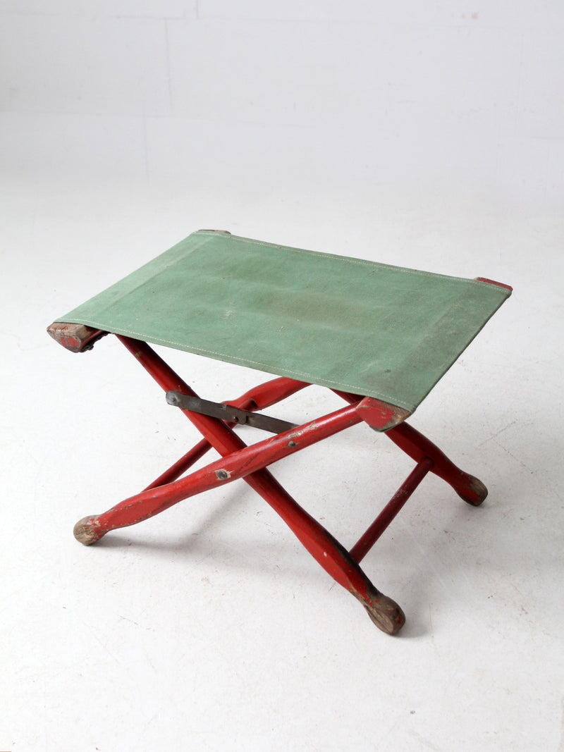 vintage red and green x-frame camp stool