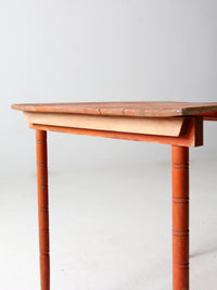 antique orange painted wood clipper folding table