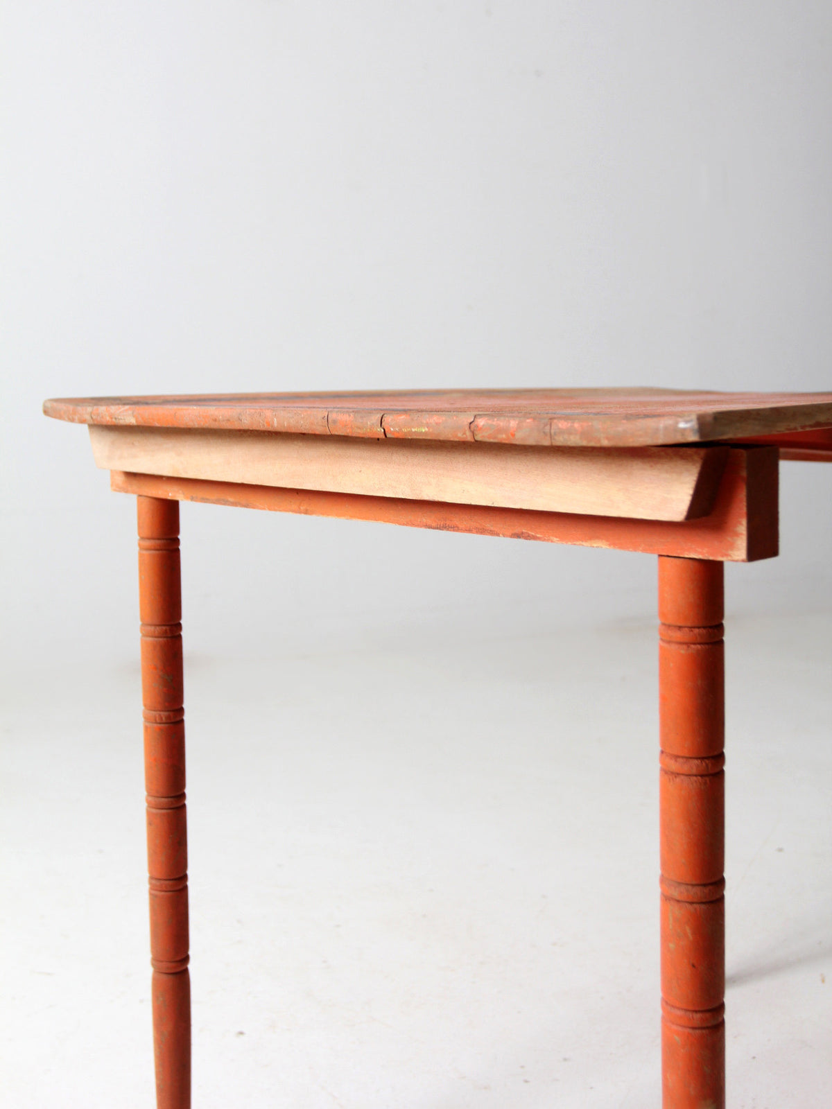 antique orange painted wood clipper folding table