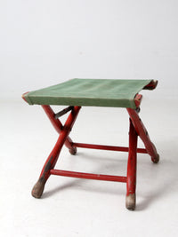 vintage red and green x-frame camp stool