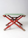 vintage red and green x-frame camp stool