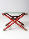 vintage red and green x-frame camp stool
