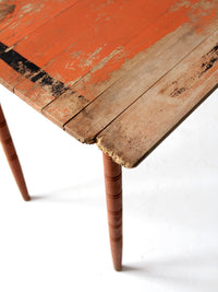 antique orange painted wood clipper folding table
