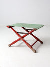 vintage red and green x-frame camp stool