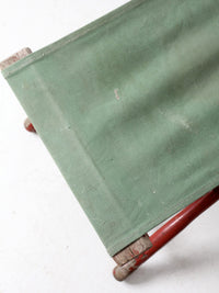 vintage red and green x-frame camp stool