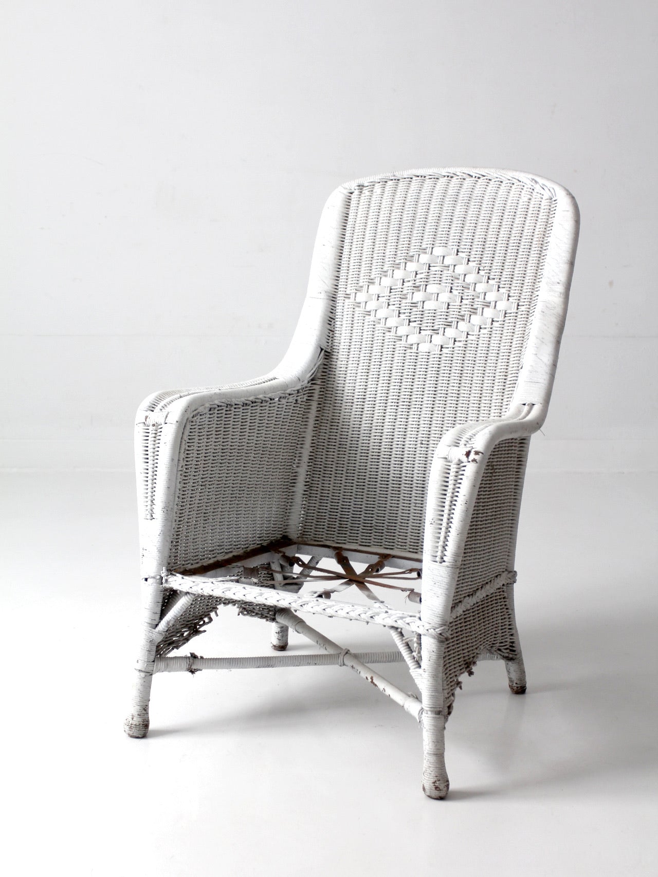 antique white wicker porch chair