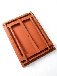 antique orange painted wood clipper folding table