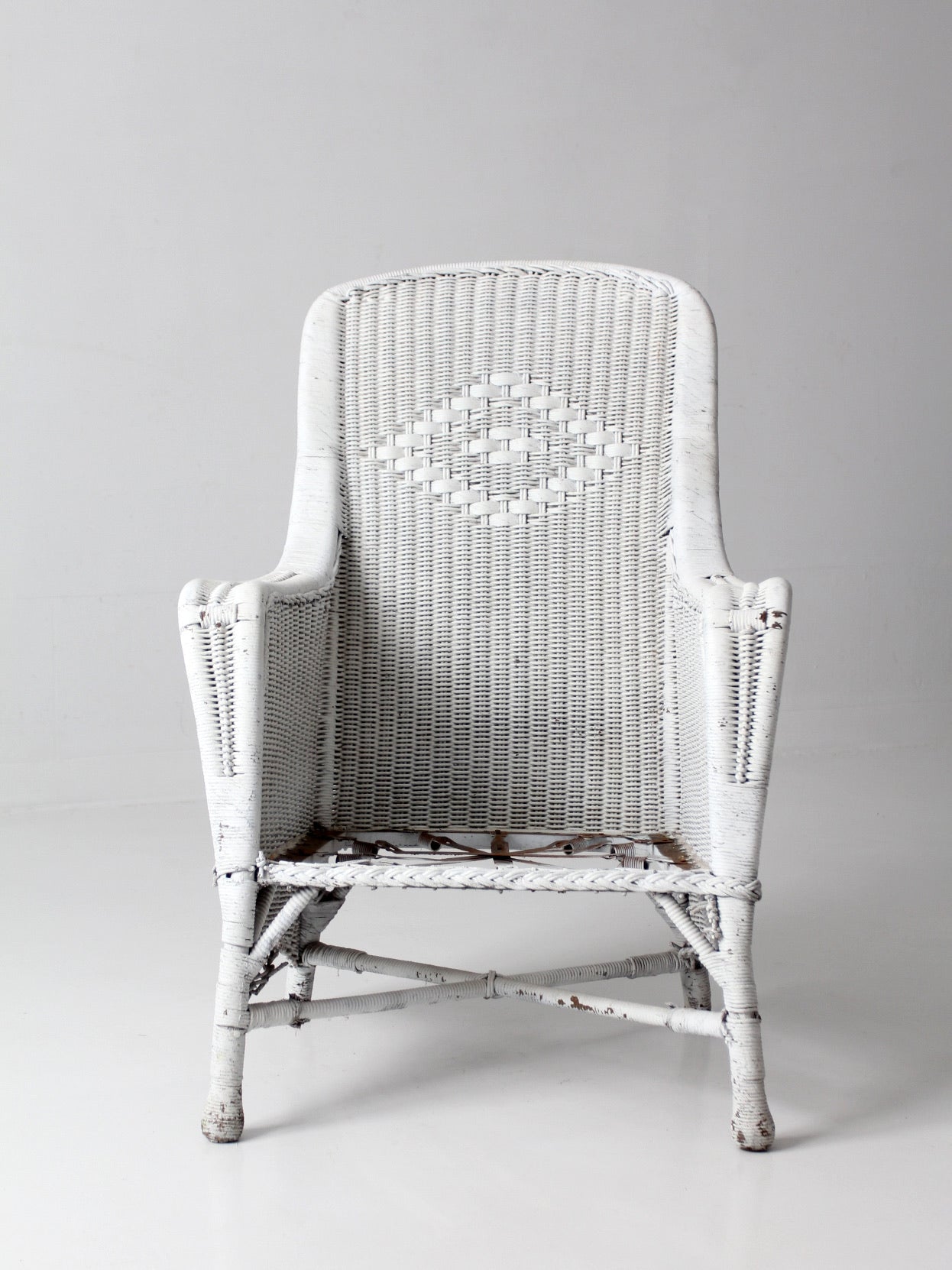 antique white wicker porch chair