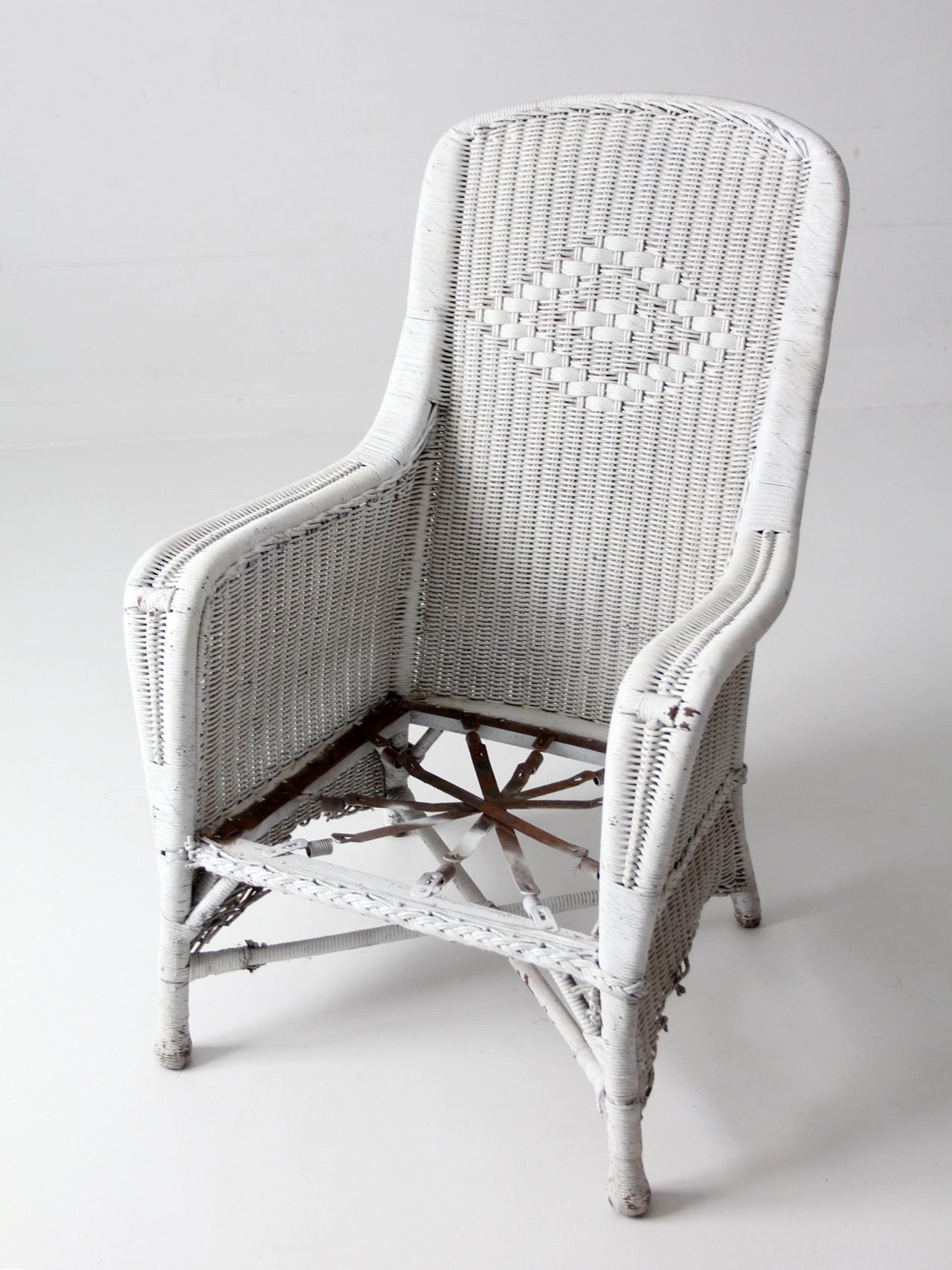 antique white wicker porch chair