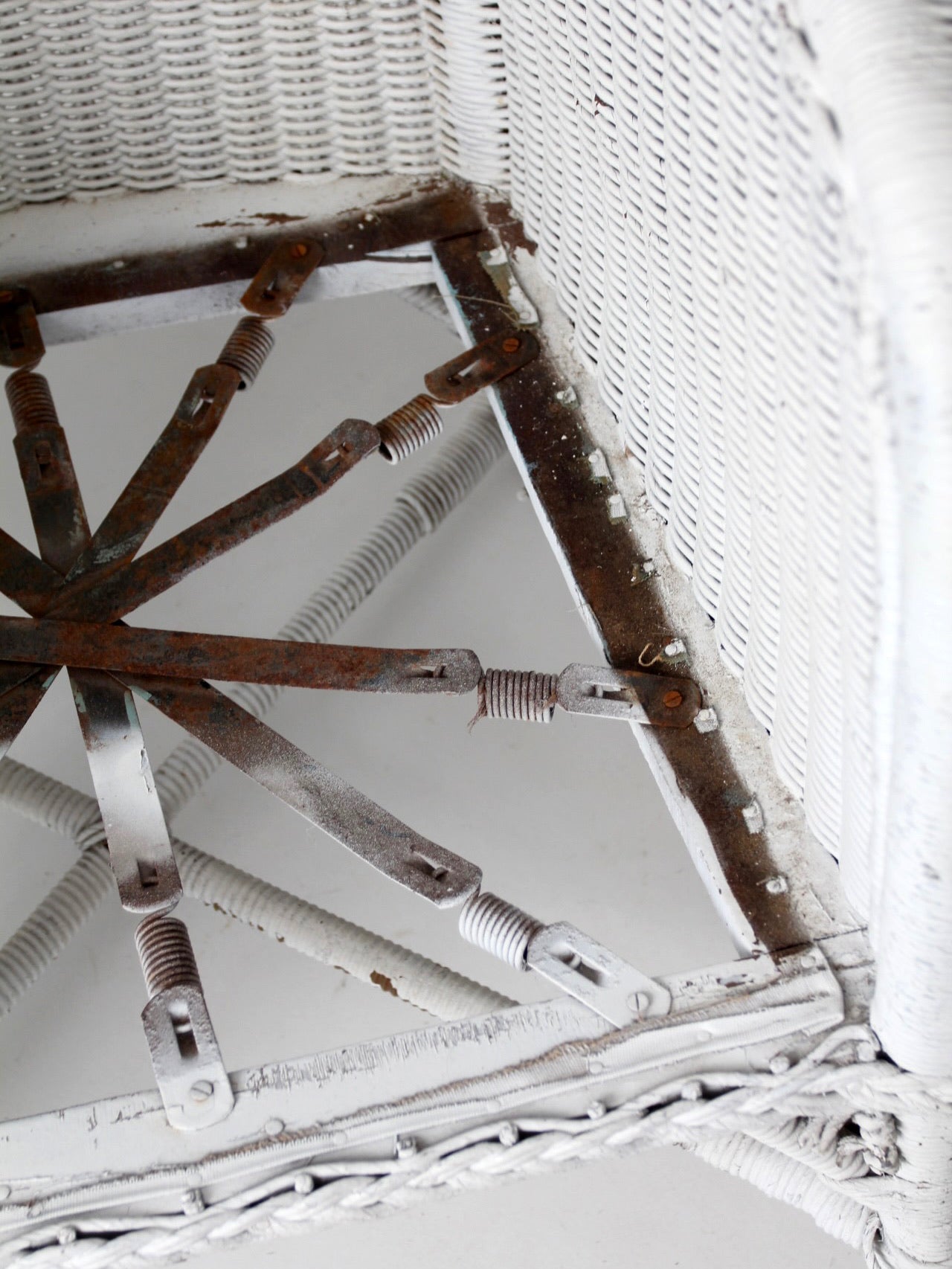 antique white wicker porch chair
