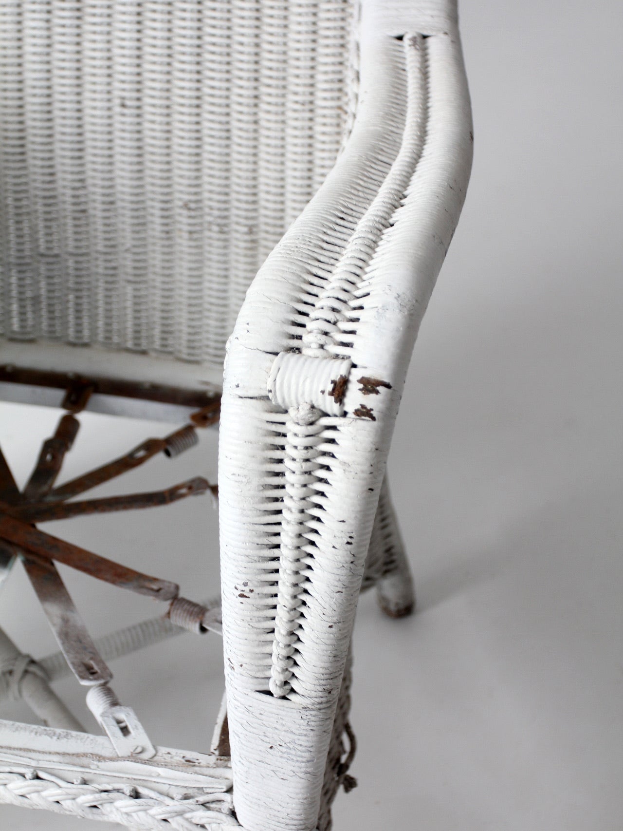 antique white wicker porch chair
