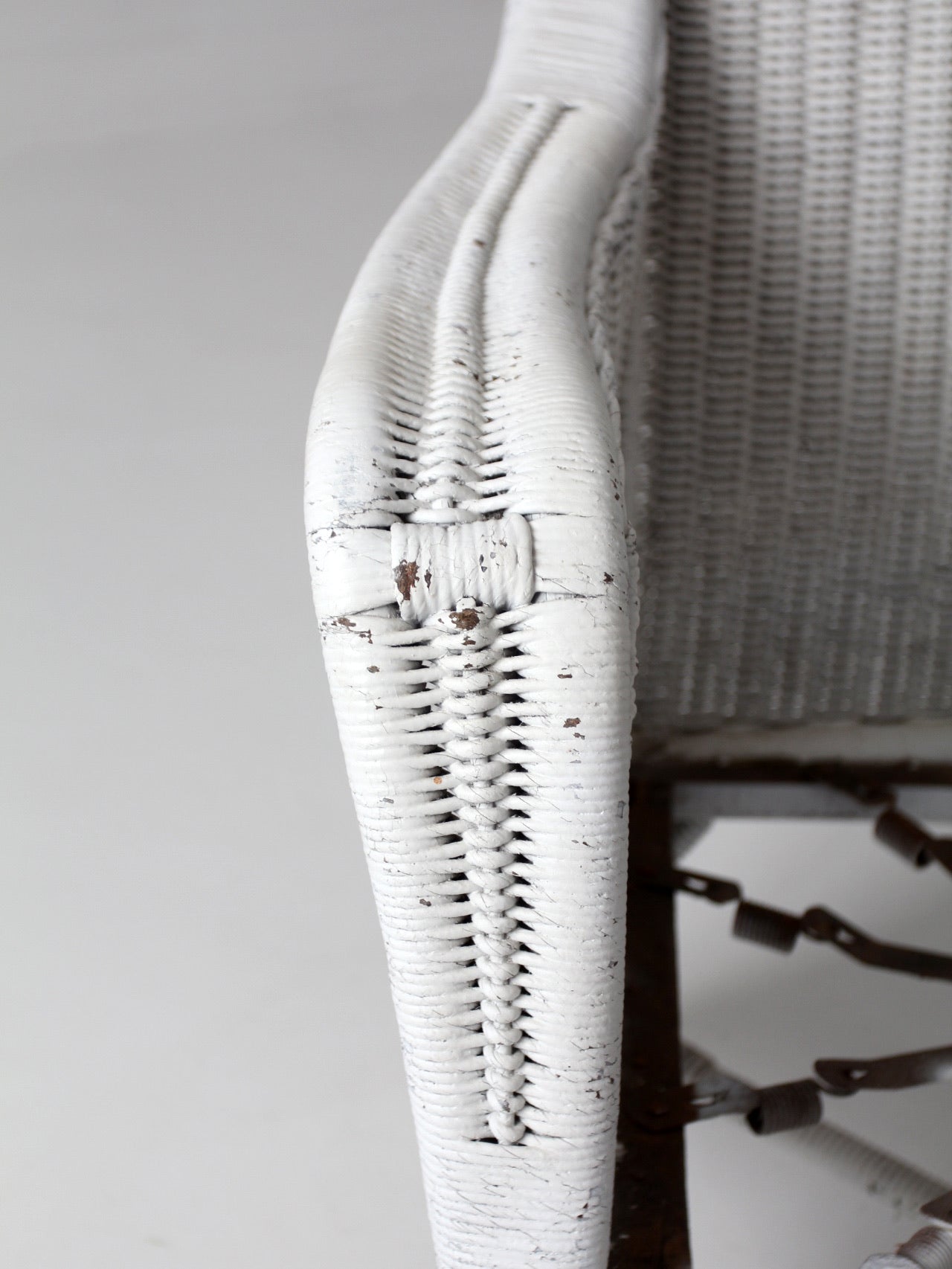 antique white wicker porch chair