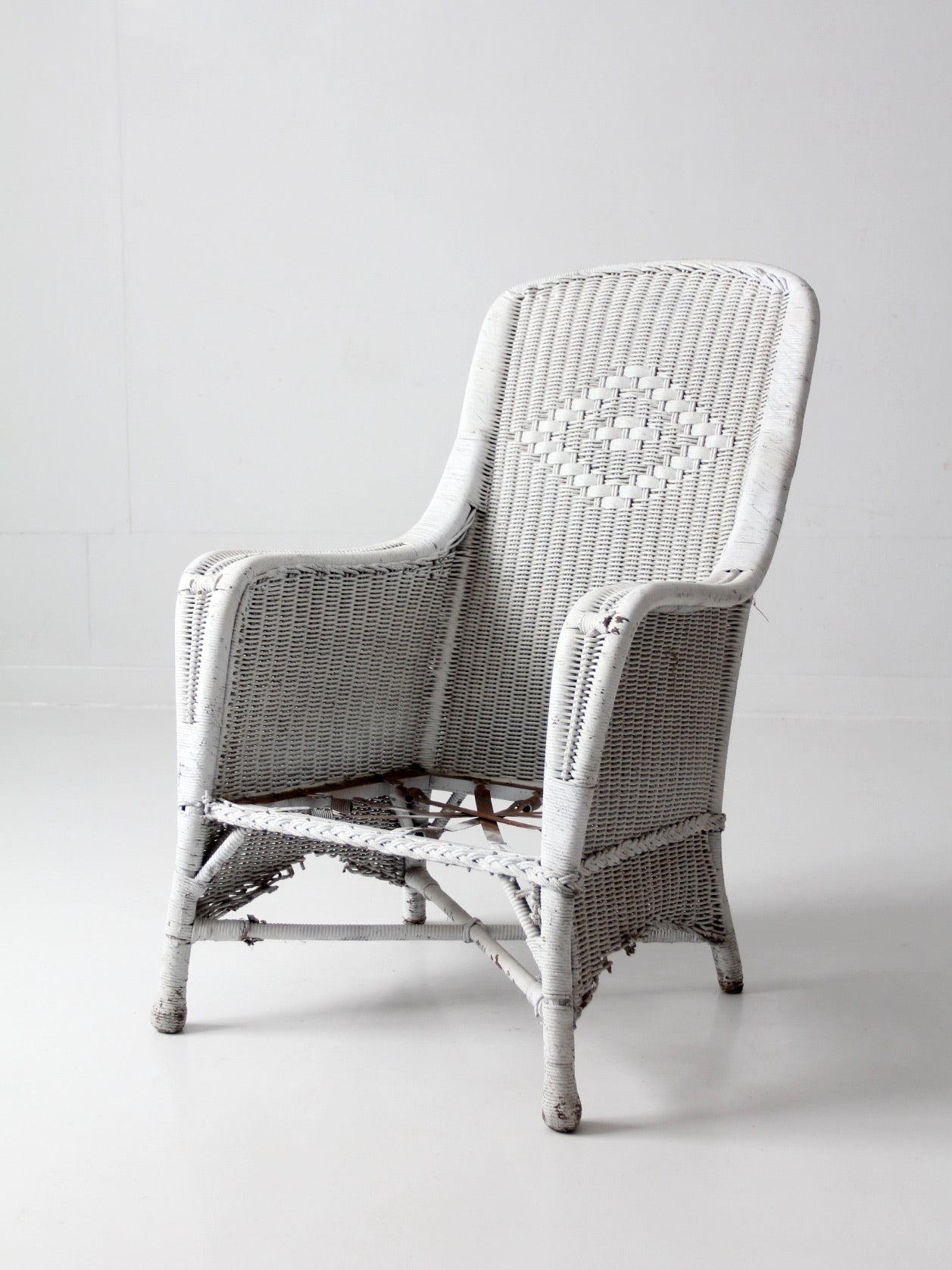 antique white wicker porch chair