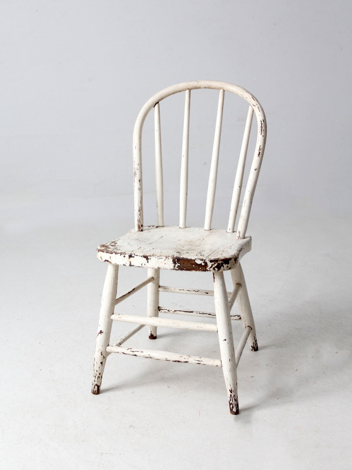 antique white spindle back chair
