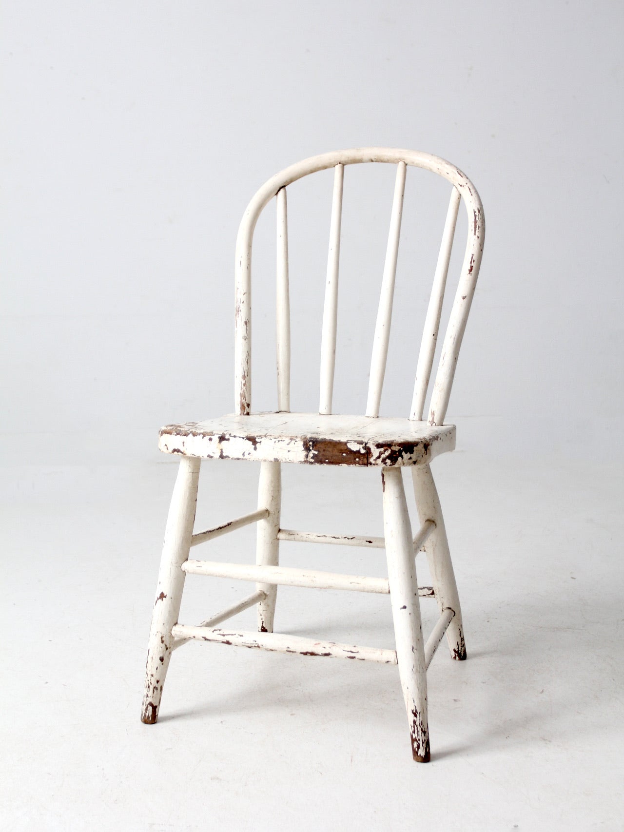 antique white spindle back chair
