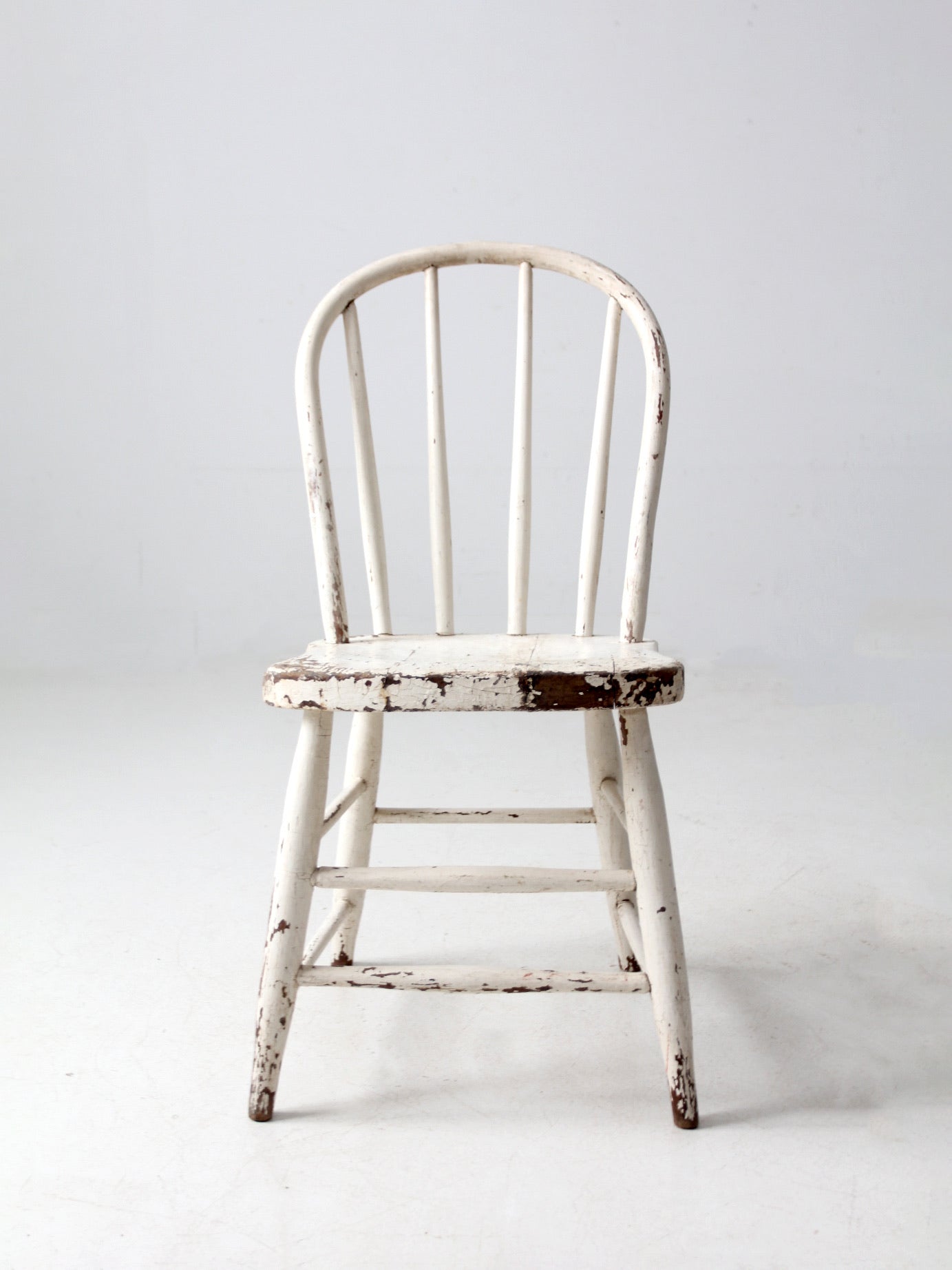 antique white spindle back chair
