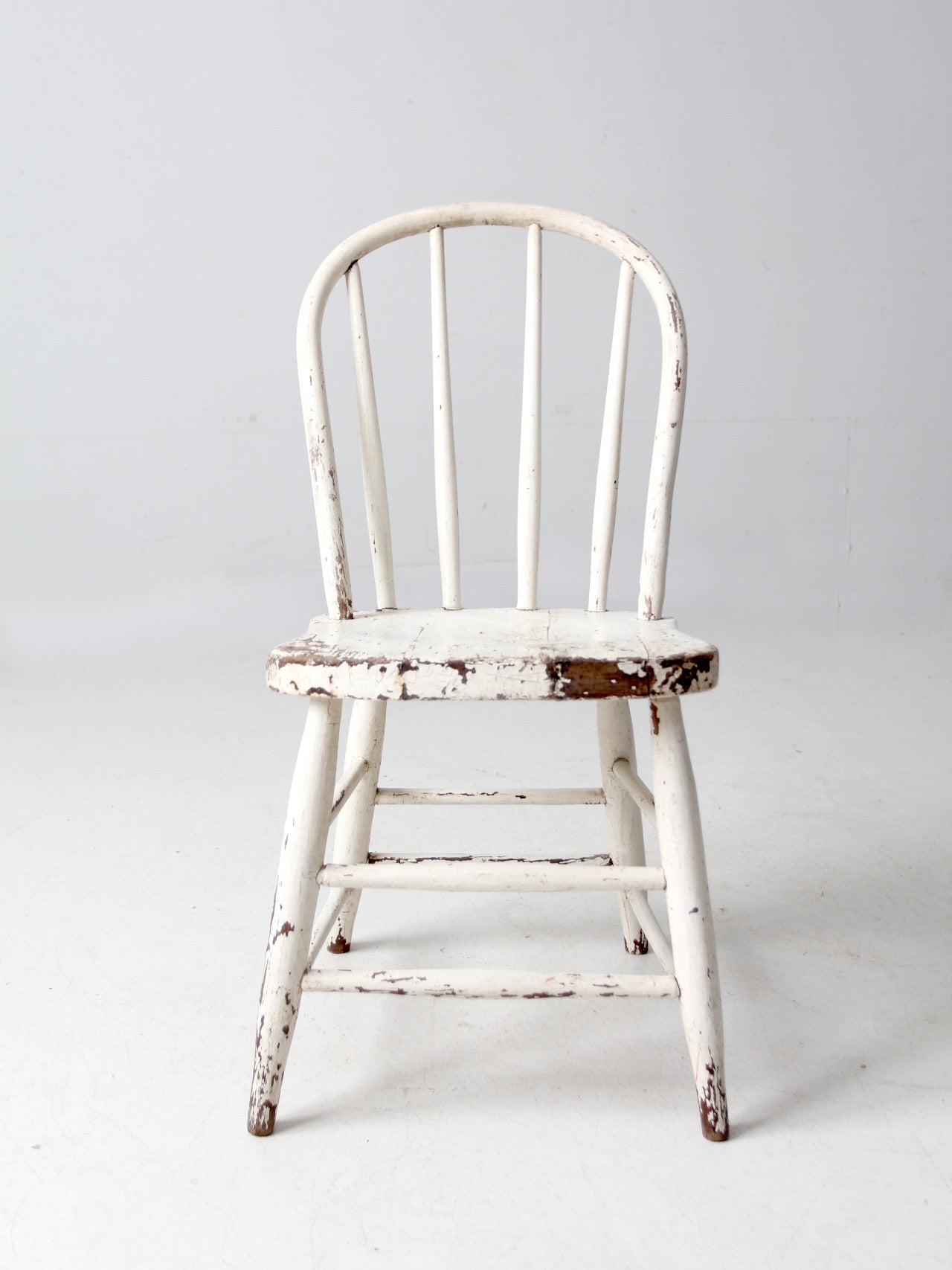 antique white spindle back chair