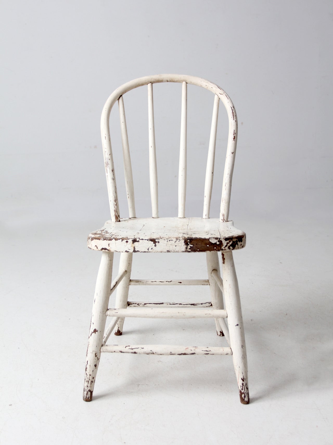 antique white spindle back chair