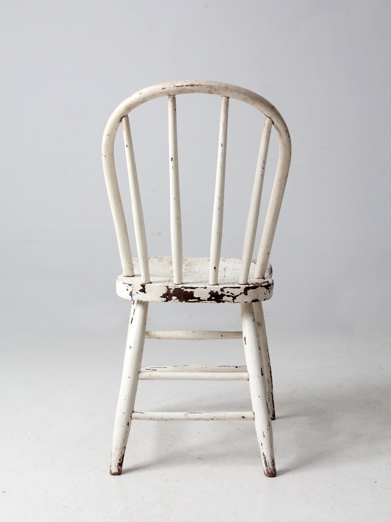 antique white spindle back chair