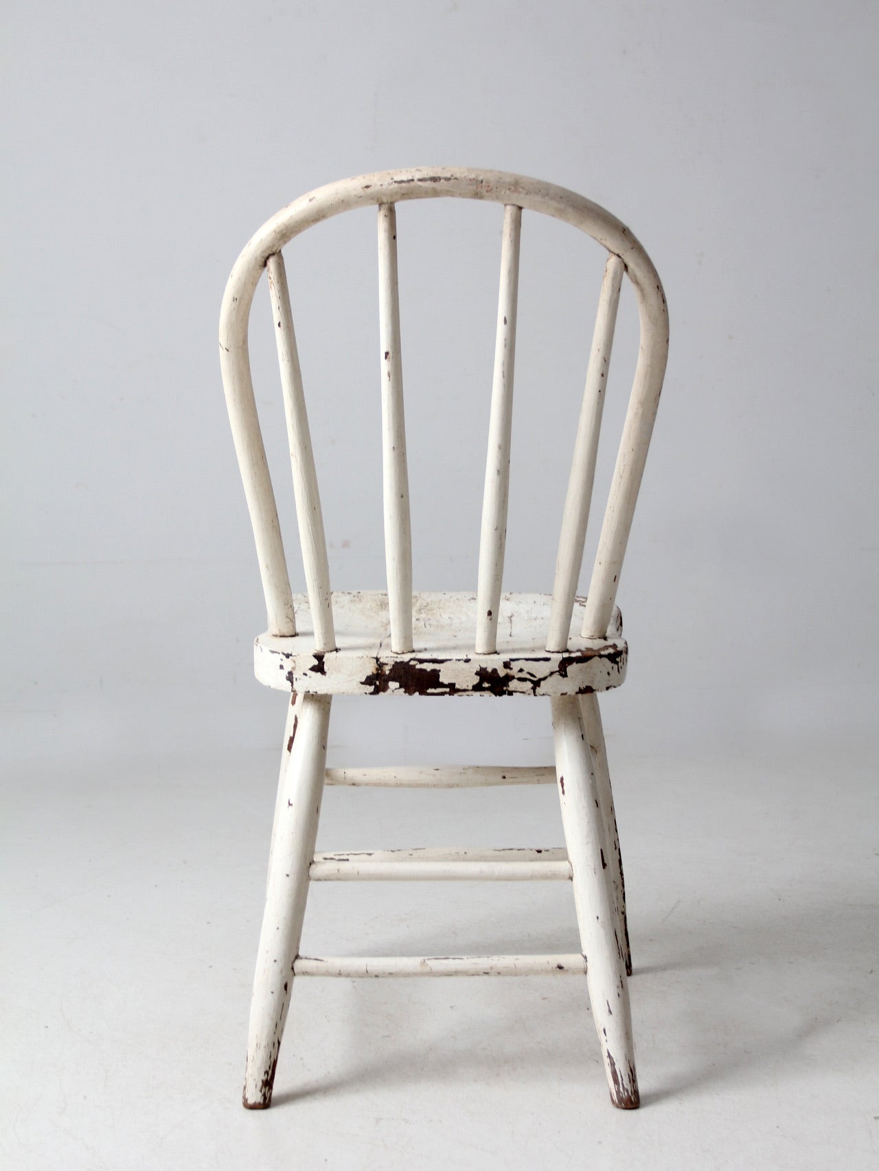 antique white spindle back chair