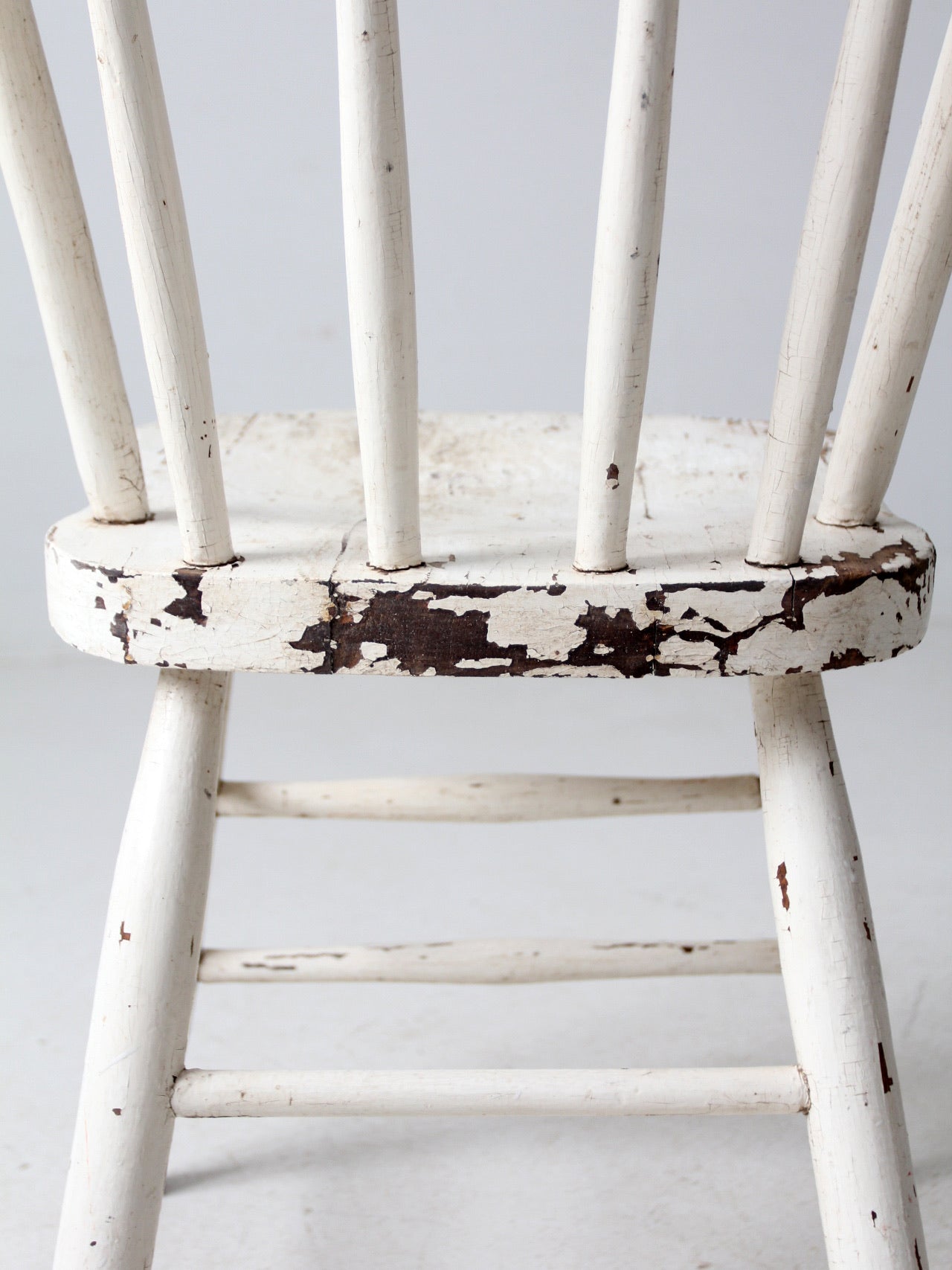 antique white spindle back chair
