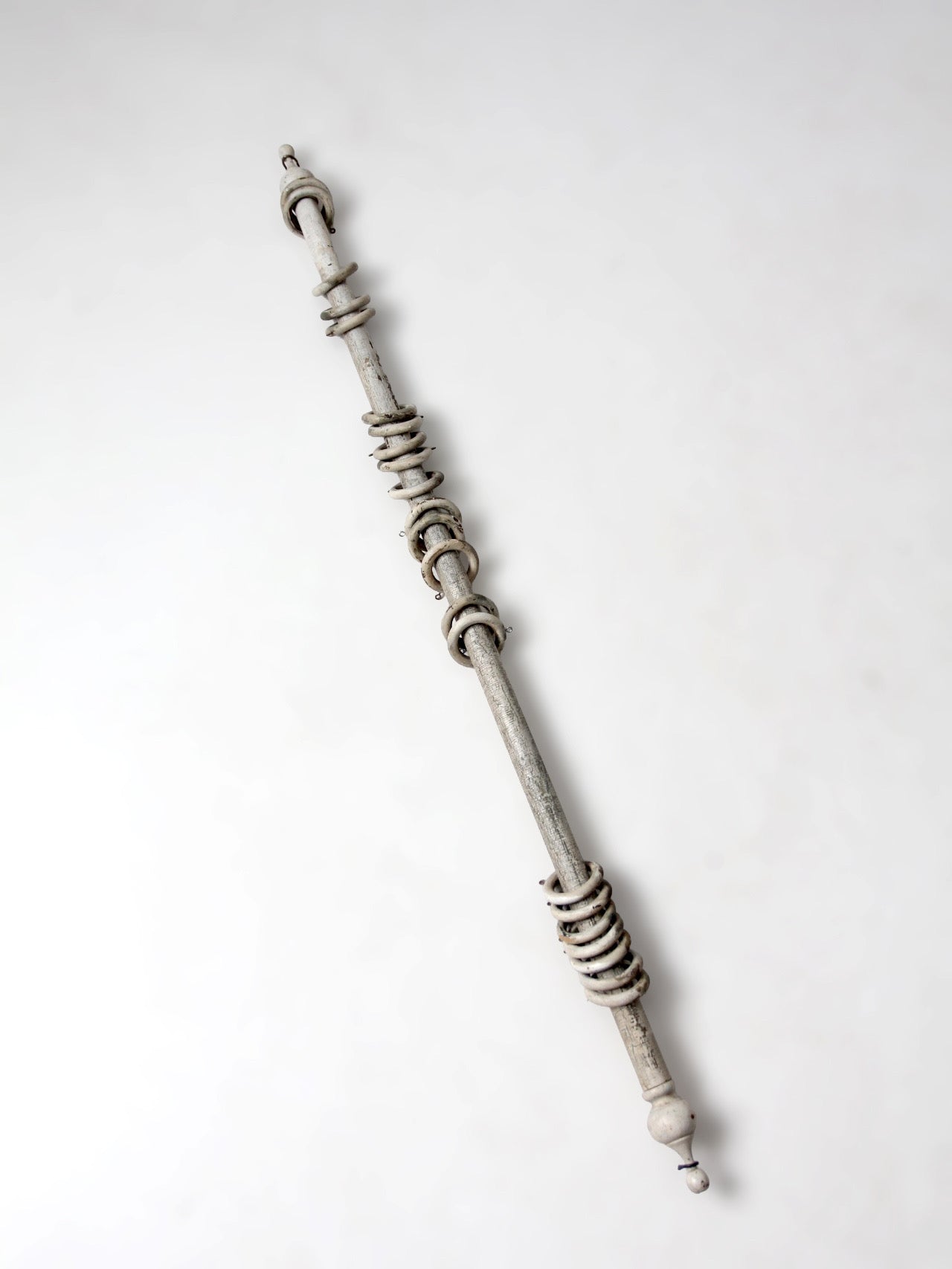 antique painted wood curtain rod with rings