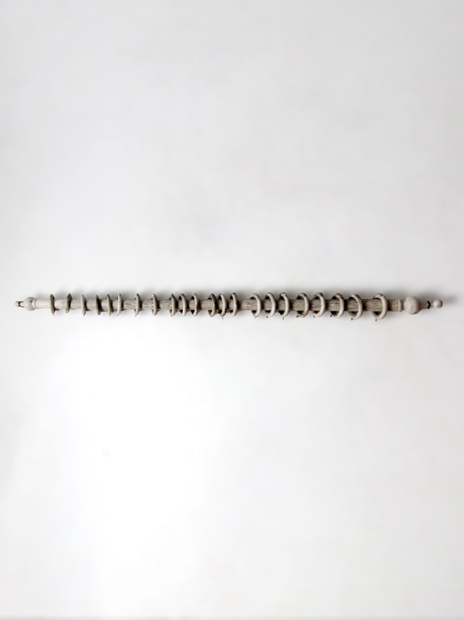 antique painted wood curtain rod with rings