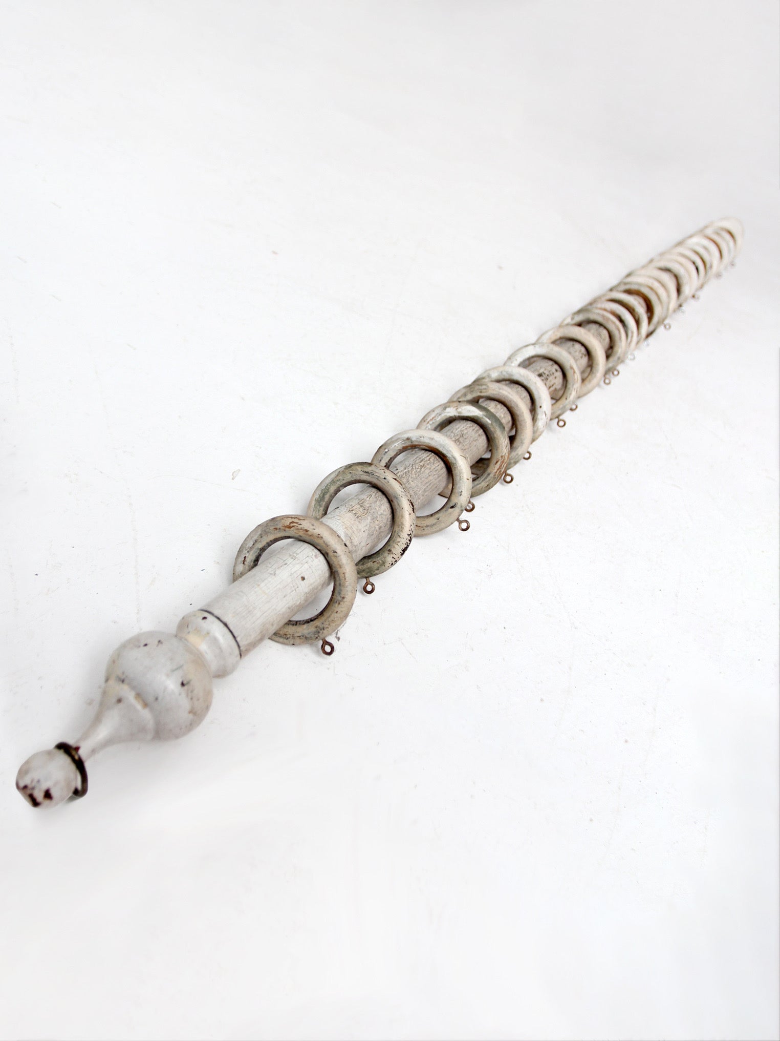 antique painted wood curtain rod with rings