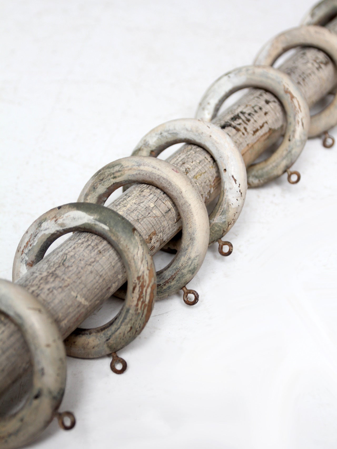 antique painted wood curtain rod with rings