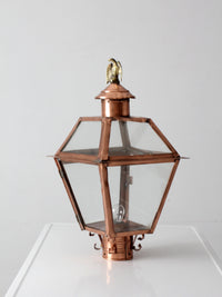 vintage copper lantern light fixture with brass eagle finial
