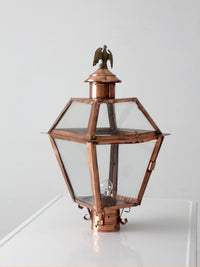 vintage copper lantern light fixture with brass eagle finial