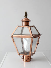 vintage copper lantern light fixture with brass eagle finial