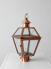 vintage copper lantern light fixture with brass eagle finial